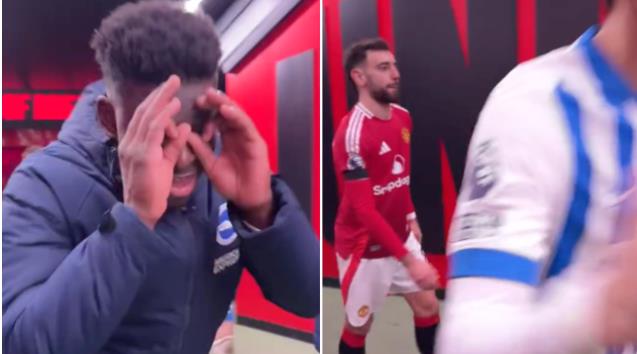 Carlos Baleba an mung truoc mat Bruno Fernandes.